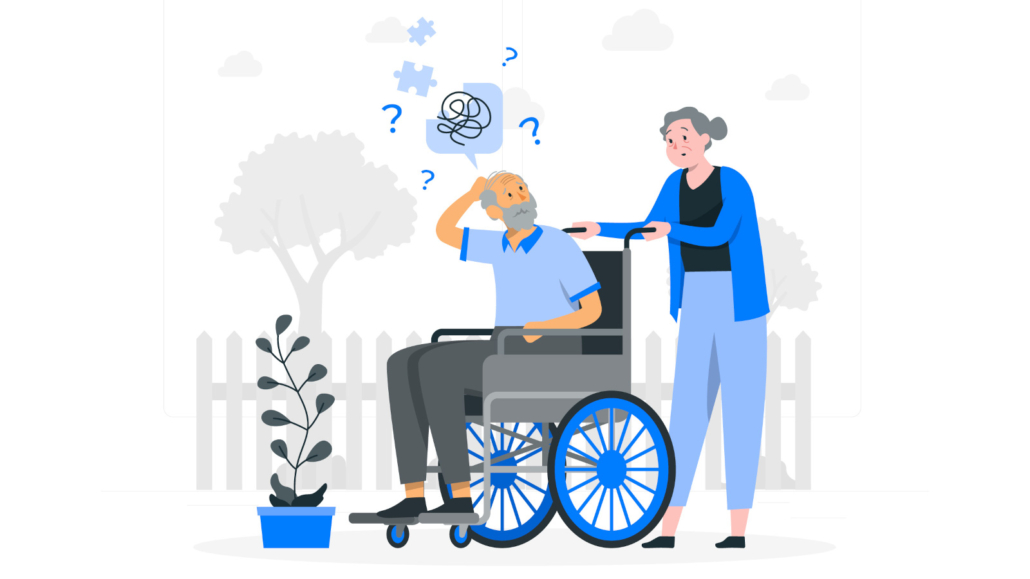 An older man in a wheelchair suffering from confusion or dementia, supported by an other woman, who is pushing the wheelchair.