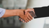 exchange money handshake